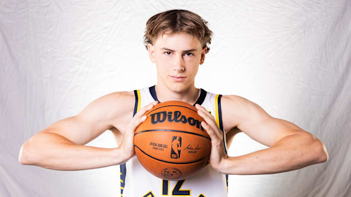 Sep 30, 2024; Indianapolis, IN, USA;  Indiana Pacers forward Johnny Furphy (12) poses for a photo during 2024 Media day.  Mandatory Credit: Trevor Ruszkowski-Imagn Images