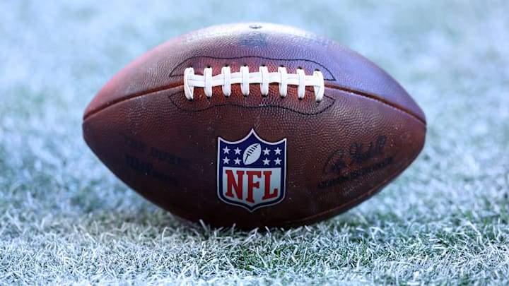 Detailed view of the NFL shield logo on an official Wilson football during the Arizona Cardinals game against the Los Angeles Rams at State Farm Stadium.