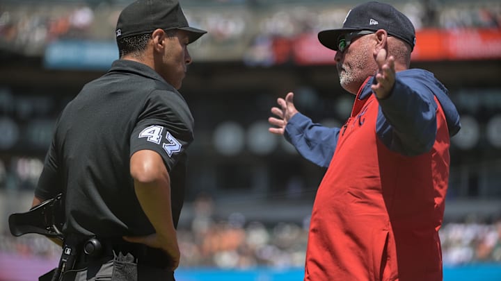 Atlanta Braves manager Brian Snitker argues a call with umpire Gabe Morales (47) during the fifth inning of the game against the San Francisco Giants at Oracle Park.