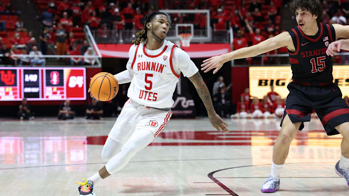 Feb 29, 2024; Salt Lake City, Utah, USA; Utah Utes guard Deivon Smith (5) dribbles the ball against