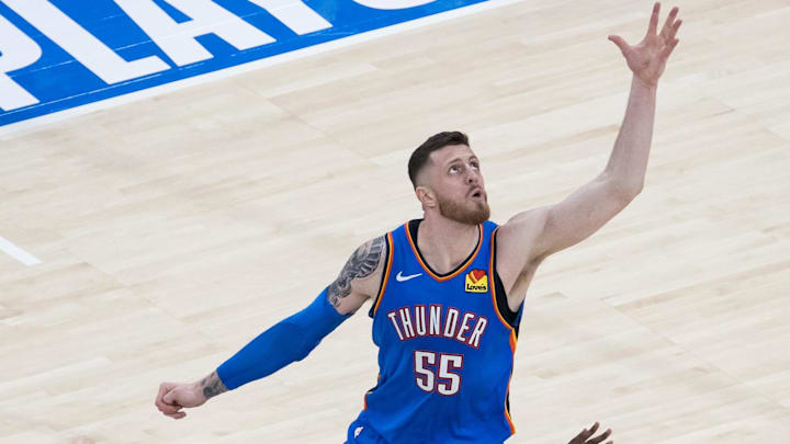 May 22, 2025; Oklahoma City, Oklahoma, USA; Oklahoma City Thunder center Isaiah Hartenstein (55) and Minnesota Timberwolves guard Anthony Edwards (5) fight for the ball in the second quarter during game two of the western conference finals for the 2025 NBA Playoffs at Paycom Center. Mandatory Credit: Brett Rojo-Imagn Images