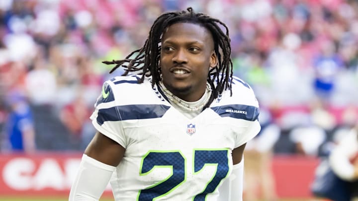 Dec 8, 2024; Glendale, Arizona, USA; Seattle Seahawks cornerback Riq Woolen (27) against the Arizona Cardinals at State Farm Stadium. Mandatory Credit: Mark J. Rebilas-Imagn Images