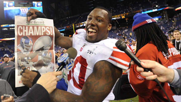 Indianapolis 2/5/2012 New York Giants defensive end Jason Pierre-Paul (90) holds up The Record while being interviewed on television after defeating the New England Patriots to win Super Bowl XLVI at Lucas Oil Stadium. Jpp 4 Indianapolis 2/5/2012 New York Giants defensive end Jason Pierre-Paul (90) holds up The Record while being interviewed on television after defeating the New England Patriots to win Super Bowl XLVI at Lucas Oil Stadium. Jpp 4