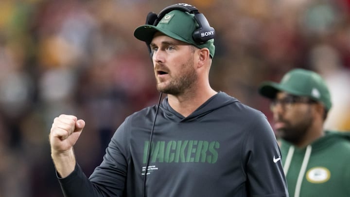 Oct 19, 2025; Glendale, Arizona, USA; Green Bay Packers quarterbacks coach Sean Mannion against the Arizona Cardinals at State Farm Stadium. Mandatory Credit: Mark J. Rebilas-Imagn Images Oct 19, 2025; Glendale, Arizona, USA; Green Bay Packers quarterbacks coach Sean Mannion against the Arizona Cardinals at State Farm Stadium. Mandatory Credit: Mark J. Rebilas-Imagn Images