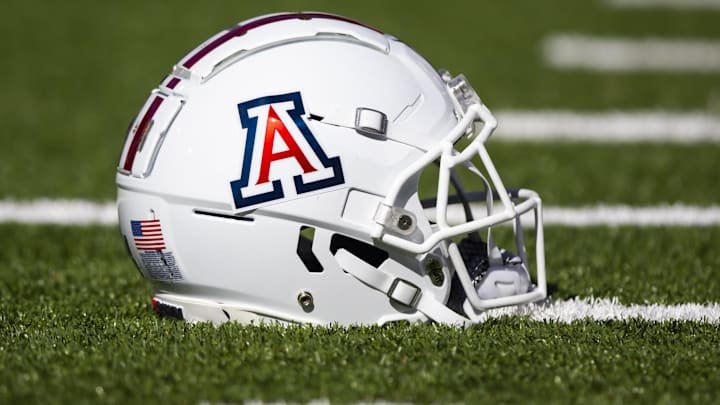 Nov 25, 2022; Tucson, Arizona, USA; Detailed view of an Arizona Wildcats helmet on the field during the Territorial Cup at Arizona Stadium. Mandatory Credit: Mark J. Rebilas-Imagn Images