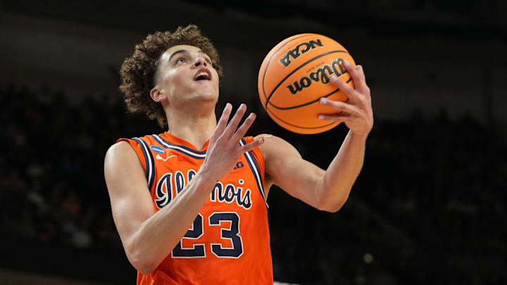 Mar 21, 2026; Greenville, SC, USA; Illinois Fighting Illini guard Keaton Wagler (23) shoots in the first half during a second round game of the men's 2026 NCAA Tournament at Bon Secours Wellness Arena.