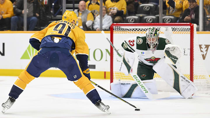Feb 4, 2026; Nashville, Tennessee, USA; Minnesota Wild goaltender Filip Gustavsson (32) blocks the shot of Nashville Predators center Steven Stamkos (91) during the first period at Bridgestone Arena. Mandatory Credit: Steve Roberts-Imagn Images Feb 4, 2026; Nashville, Tennessee, USA; Minnesota Wild goaltender Filip Gustavsson (32) blocks the shot of Nashville Predators center Steven Stamkos (91) during the first period at Bridgestone Arena. Mandatory Credit: Steve Roberts-Imagn Images