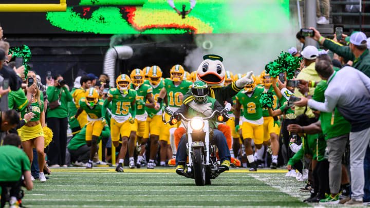 Oct 21, 2023; Eugene, Oregon, USA; Oregon Ducks mascot The Duck leads the team entrance against the Washington State Cougars at Autzen Stadium. Mandatory Credit: Craig Strobeck-USA TODAY Sports Oct 21, 2023; Eugene, Oregon, USA; Oregon Ducks mascot The Duck leads the team entrance against the Washington State Cougars at Autzen Stadium. Mandatory Credit: Craig Strobeck-USA TODAY Sports