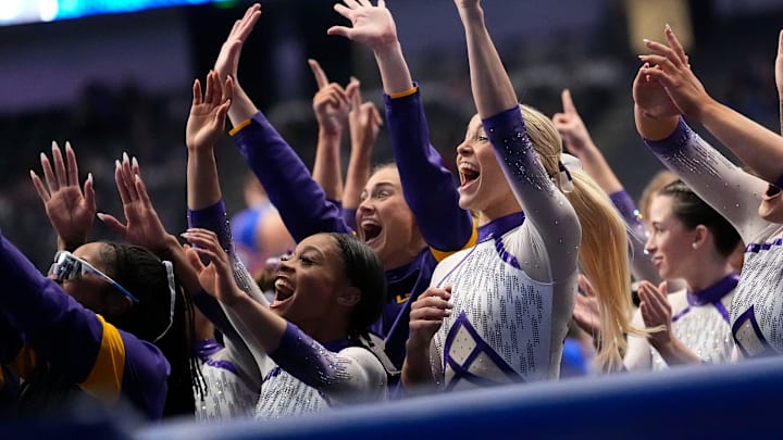 LSU gymnast Livvy Dunne celebrates with teammates during Session 2 of the SEC Gymnastics Championship at Legacy Arena in Birmingham, Alabama.