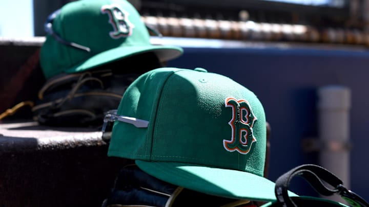 Mar 17, 2025; North Port, Florida, USA; Boston Red Sox hats on the stairs to the dugout before the start of the game  between  the Atlanta Braves and Boston Red Sox  during spring training at CoolToday Park. Mandatory Credit: Jonathan Dyer-Imagn Images
