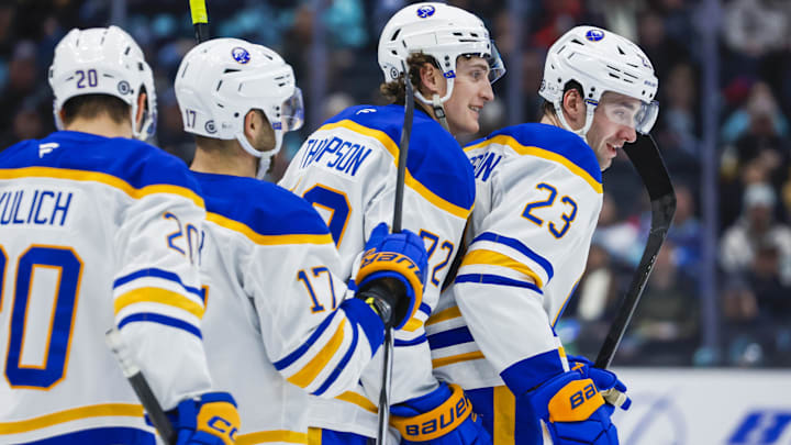 Jan 20, 2025; Seattle, Washington, USA; Buffalo Sabres center Tage Thompson (72) celebrates with defenseman Mattias Samuelsson (23) after scoring a goal against the Seattle Kraken during the second period at Climate Pledge Arena. Mandatory Credit: Joe Nicholson-Imagn Images