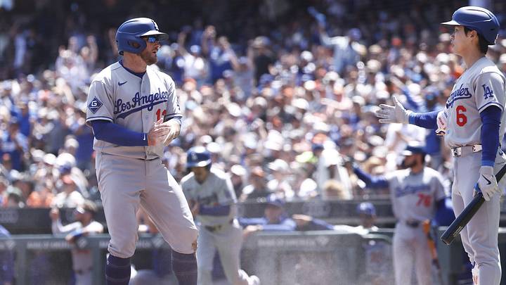 Apr 23, 2026; San Francisco, California, USA; Los Angeles Dodgers third baseman Max Muncy (13) looks to celebrate with on deck batter shortstop Hyeseong Kim (6) after scoring a run against the San Francisco Giants during the second inning at Oracle Park. Mandatory Credit: Kelley L Cox-Imagn Images Apr 23, 2026; San Francisco, California, USA; Los Angeles Dodgers third baseman Max Muncy (13) looks to celebrate with on deck batter shortstop Hyeseong Kim (6) after scoring a run against the San Francisco Giants during the second inning at Oracle Park. Mandatory Credit: Kelley L Cox-Imagn Images