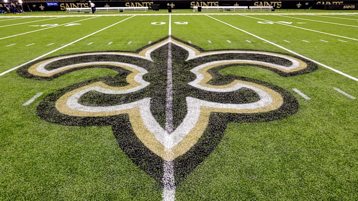 Oct 30, 2022; New Orleans, Louisiana, USA;  General view of the New Orleans Saints logo as the midfield logo fleur-de-lis after the game between the New Orleans Saints and the Las Vegas Raiders at Caesars Superdome. Mandatory Credit: Stephen Lew-Imagn Images