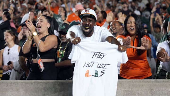 Oct 5, 2024; Berkeley, California, USA; Miami Hurricanes fans cheer during the fourth quarter against the California Golden Bears at California Memorial Stadium. Mandatory Credit: Darren Yamashita-Imagn Images