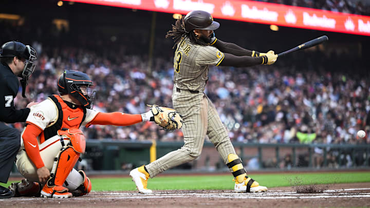 Jun 4, 2025; San Francisco, California, USA; San Diego Padres right fielder Fernando Tatis Jr. (23) hits a single against the San Francisco Giants in the fifth inning at Oracle Park. Mandatory Credit: Eakin Howard-Imagn Images Jun 4, 2025; San Francisco, California, USA; San Diego Padres right fielder Fernando Tatis Jr. (23) hits a single against the San Francisco Giants in the fifth inning at Oracle Park. Mandatory Credit: Eakin Howard-Imagn Images