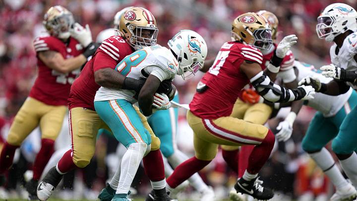 San Francisco 49ers defensive tackle Gracen Halton (93) tackles Miami Dolphins running back De'Von Achane (28) in the fourth quarter at Levi's Stadium. San Francisco 49ers defensive tackle Gracen Halton (93) tackles Miami Dolphins running back De'Von Achane (28) in the fourth quarter at Levi's Stadium.
