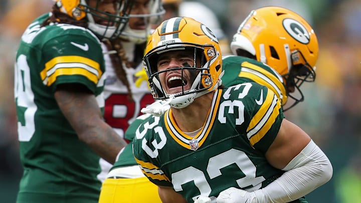Green Bay Packers safety Evan Williams (33) celebrates after forcing a fumble against the Arizona Cardinals.