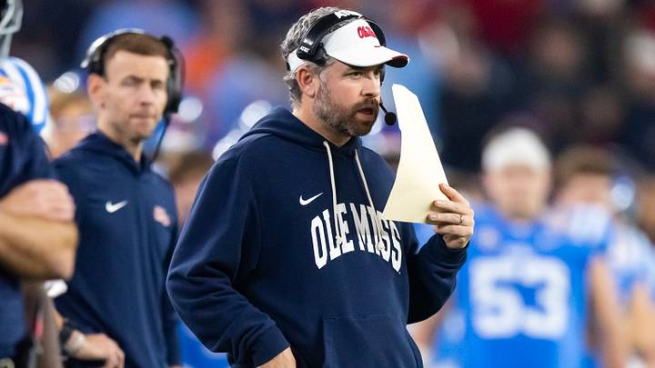 Jan 8, 2026; Glendale, AZ, USA; Mississippi Rebels head coach Pete Golding against the Miami Hurricanes during the 2026 Fiesta Bowl and semifinal game of the College Football Playoff at State Farm Stadium. Mandatory Credit: Mark J. Rebilas-Imagn Images Jan 8, 2026; Glendale, AZ, USA; Mississippi Rebels head coach Pete Golding against the Miami Hurricanes during the 2026 Fiesta Bowl and semifinal game of the College Football Playoff at State Farm Stadium. Mandatory Credit: Mark J. Rebilas-Imagn Images