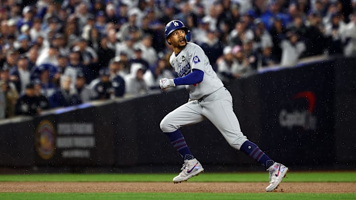 Los Angeles Dodgers outfielder Mookie Betts runs after hitting a double against the New York Yankees during Game 4 of the World Series on Oct. 29 at Yankee Stadium. Los Angeles Dodgers outfielder Mookie Betts runs after hitting a double against the New York Yankees during Game 4 of the World Series on Oct. 29 at Yankee Stadium.