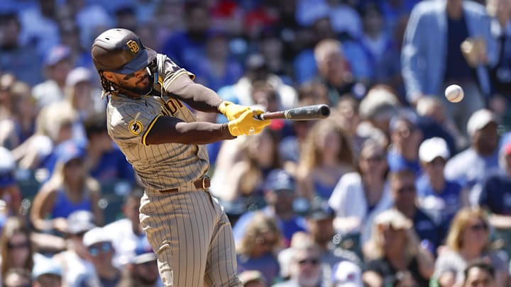 May 8, 2024; Chicago, Illinois, USA; San Diego Padres outfielder Fernando Tatis Jr. (23) hits an