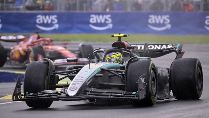 Jun 9, 2024; Montreal, Quebec, CAN; Mercedes driver Lewis Hamilton (GBR) races ahead of Ferrari driver Charles Leclerc (MCO) during the Canadian Grand Prix at Circuit Gilles Villeneuve. Mandatory Credit: Eric Bolte-USA TODAY Sports