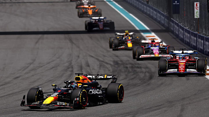 May 4, 2024; Miami Gardens, Florida, USA; Red Bull Racing driver Max Verstappen (1) lead the field into turn one during the F1 Sprint Race at Miami International Autodrome. Mandatory Credit: Peter Casey-Imagn Images