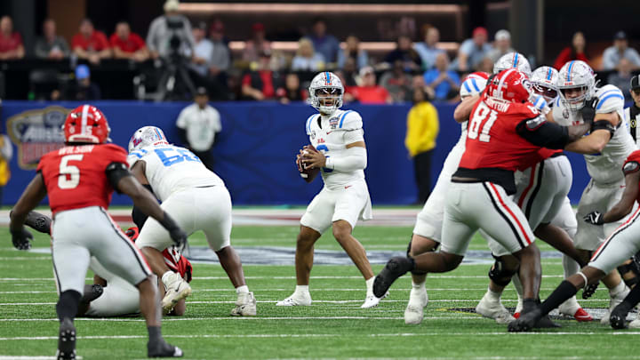 Jan 1, 2026; New Orleans, LA, USA; Mississippi Rebels quarterback Trinidad Chambliss (6) looks to pass the ball against the Georgia Bulldogs in the third quarter during the 2025 Sugar Bowl and quarterfinal game of the College Football Playoff at Caesars Superdome. Mandatory Credit: Stephen Lew-Imagn Images