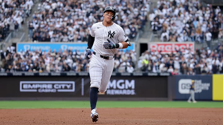 Mar 30, 2025; Bronx, New York, USA; New York Yankees right fielder Aaron Judge (99) rounds the bases after hitting a two run home run against the Milwaukee Brewers during the first inning at Yankee Stadium. 