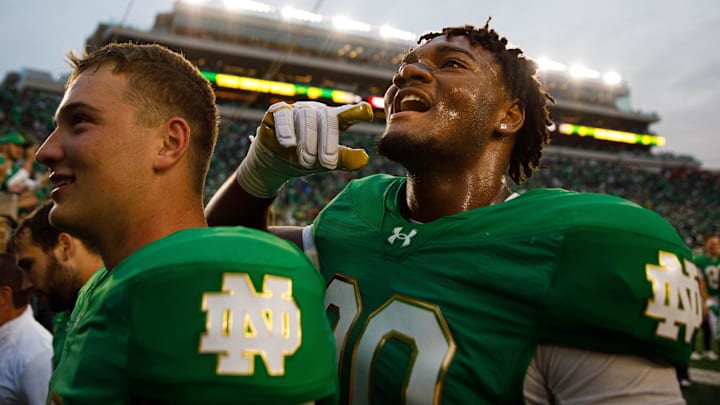 Notre Dame defensive lineman Bryce Young, right, celebrates after winning a NCAA college football game 31-24 between Notre Dame and Louisville at Notre Dame Stadium on Saturday, Sept. 28, 2024, in South Bend.