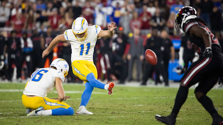 Oct 21, 2024; Glendale, Arizona, USA; Los Angeles Chargers kicker Cameron Dicker (11) kicks a field goal against the Arizona Cardinals in the second half at State Farm Stadium. Mandatory Credit: Mark J. Rebilas-Imagn Images