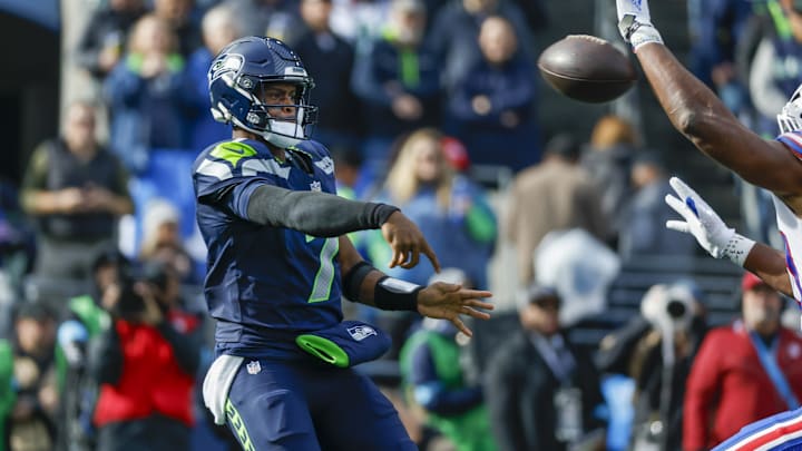 Oct 27, 2024; Seattle, Washington, USA; Seattle Seahawks quarterback Geno Smith (7) passes against the Buffalo Bills during the first quarter at Lumen Field. Mandatory Credit: Joe Nicholson-Imagn Images Oct 27, 2024; Seattle, Washington, USA; Seattle Seahawks quarterback Geno Smith (7) passes against the Buffalo Bills during the first quarter at Lumen Field. Mandatory Credit: Joe Nicholson-Imagn Images
