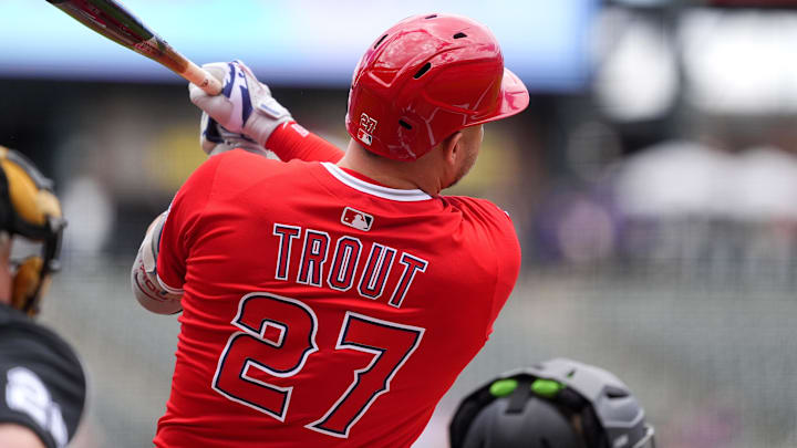Sep 21, 2025; Denver, Colorado, USA; Los Angeles Angels designated hitter Mike Trout (27) double in the first inning against the Colorado Rockies at Coors Field. Mandatory Credit: Ron Chenoy-Imagn Images
