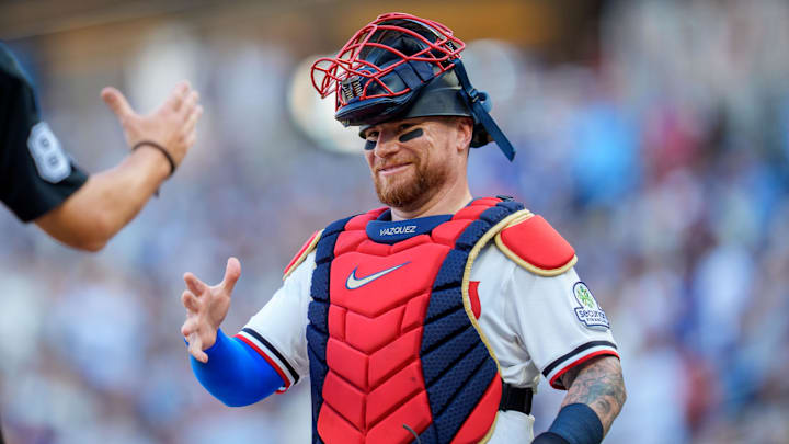Christian Vázquez of Minnesota Twins greets umpire