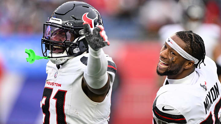 Oct 13, 2024; Foxborough, Massachusetts, USA; Houston Texans running back Dameon Pierce (31) celebrates with running back Joe Mixon (28) after scoring a touchdown against the New England Patriots during the first half at Gillette Stadium.