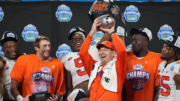 Dec 3, 2022; Charlotte, North Carolina, USA; Clemson Tigers head coach Dabo Swinney celebrates after defeating the North Carolina Tar Heels 39-10 to win the ACC Championship game at Bank of America Stadium. Mandatory Credit: Bob Donnan-Imagn Images