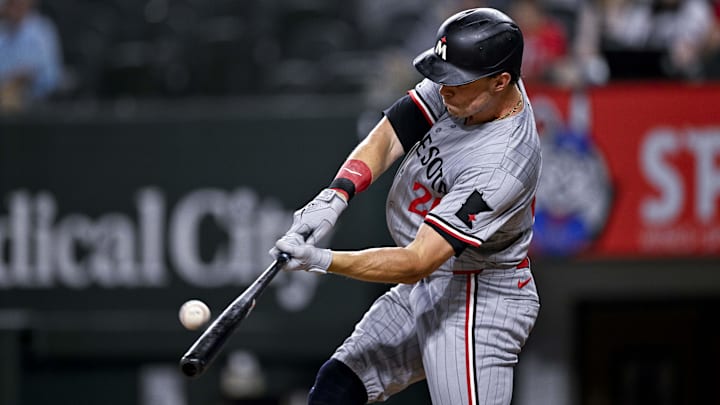 Aug 15, 2024; Arlington, Texas, USA; Minnesota Twins right fielder Max Kepler (26) bats against the Texas Rangers during the fourth inning at Globe Life Field