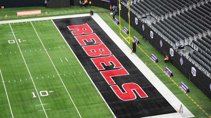 Dec 2, 2023; Las Vegas, NV, USA; The UNLV Rebels logo in the end zone is seen before the Mountain West Championship between the Boise State Broncos and the UNLV Rebels at Allegiant Stadium. Mandatory Credit: Kirby Lee-Imagn Images