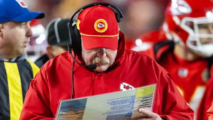 Jan 26, 2025; Kansas City, MO, USA; Kansas City Chiefs head coach Andy Reid looks at his play sheet against the Buffalo Bills during the AFC Championship game at GEHA Field at Arrowhead Stadium. Mandatory Credit: Mark J. Rebilas-Imagn Images