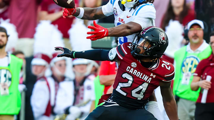 Oct 5, 2024; Columbia, South Carolina, USA; South Carolina Gamecocks defensive back Jalon Kilgore (24) breaks up a pass intended for Mississippi Rebels wide receiver Antwane Wells Jr. (3) in the second quarter at Williams-Brice Stadium. Mandatory Credit: Jeff Blake-Imagn Images