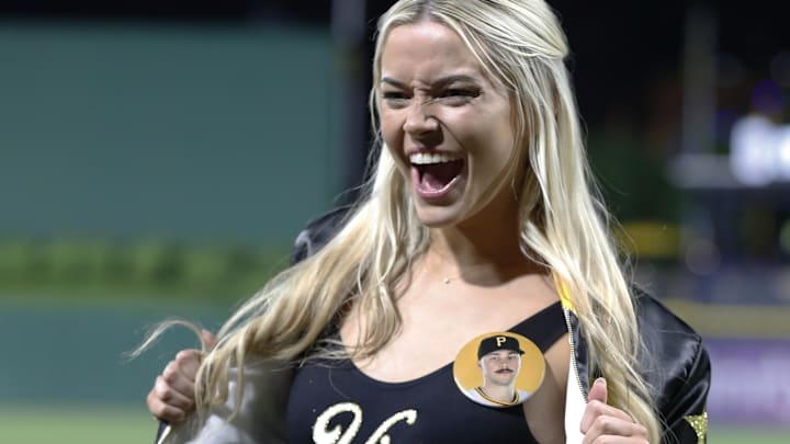 Louisiana State University gymnast Livvy Dunn reacts on the field after her boyfriend Pittsburgh Pirates starting pitcher Paul Skenes (not pictured) made his major league debut.
