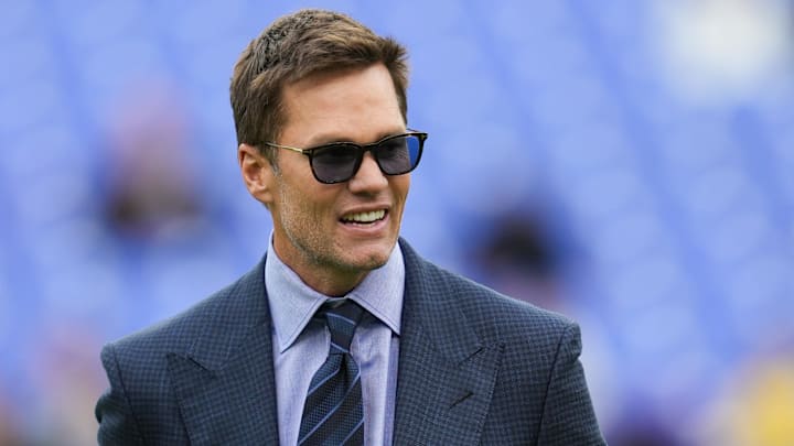 Oct 12, 2025; Baltimore, Maryland, USA; Fox Sports announcer Tom Brady looks on before the game between the Baltimore Ravens and the Los Angeles Rams at M&T Bank Stadium.