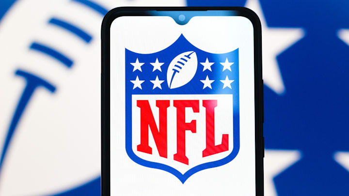 In this photo illustration, the NFL (National Football...