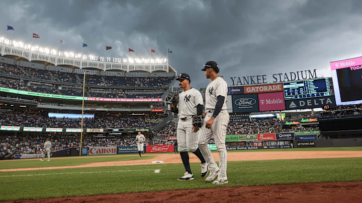 New York Yankees center fielder Trent Grisham (12) and right fielder Juan Soto (22) walk off the field after the top of the eighth inning against the Toronto Blue Jays at Yankee Stadium on Aug 4. New York Yankees center fielder Trent Grisham (12) and right fielder Juan Soto (22) walk off the field after the top of the eighth inning against the Toronto Blue Jays at Yankee Stadium on Aug 4.