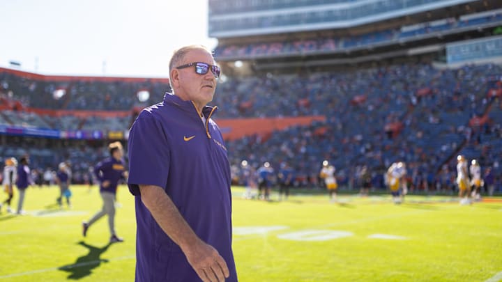 Nov 16, 2024; Gainesville, Florida, USA; LSU Tigers head coach Brian Kelly walks onto the field before a game against the Florida Gators at Ben Hill Griffin Stadium. Mandatory Credit: Matt Pendleton-Imagn Images