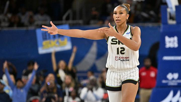 Aug 21, 2026; Chicago, Illinois, USA;  Chicago Sky guard Sydney Taylor (12) celebrates her three point shot against the Golden State Valkyries during the first half at the Wintrust Arena.  Mandatory Credit: Patrick Gorski-Imagn Images