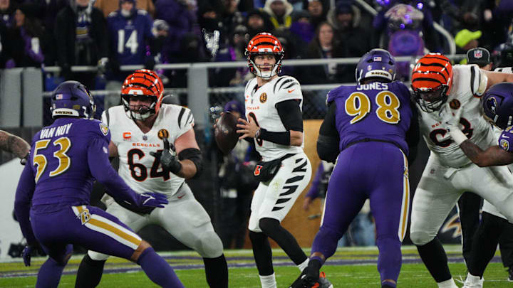 Bengals Joe Burrow (9) looks for a pass during their game against the Ravens at M&T Bank Stadium on Thanksgiving Thursday November 27, 2025.