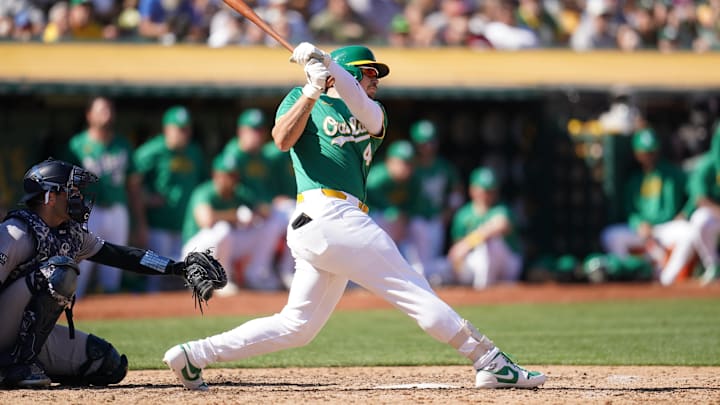 Sep 22, 2024; Oakland, California, USA; Oakland Athletics infielder Ryan Noda hits a two-run double against the New York Yankees in the sixth inning at the Oakland-Alameda County Coliseum. Mandatory Credit: Cary Edmondson-Imagn Images Sep 22, 2024; Oakland, California, USA; Oakland Athletics infielder Ryan Noda hits a two-run double against the New York Yankees in the sixth inning at the Oakland-Alameda County Coliseum. Mandatory Credit: Cary Edmondson-Imagn Images