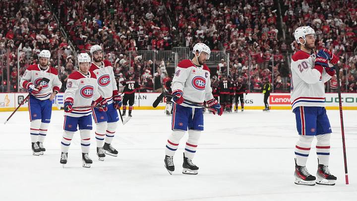 May 29, 2026; Raleigh, North Carolina, USA; Montreal Canadiens left wing Juraj Slafkovsky (20) skates toward goaltender Jakub Dobes (not pictured) with center Nick Suzuki (14), right wing Cole Caufield (13), right wing Josh Anderson (17) and left wing Alexandre Texier (85) after losing to the Carolina Hurricanes in game five of the Eastern Conference Final of the 2026 Stanley Cup Playoffs at Lenovo Center. Mandatory Credit: James Guillory-Imagn Images