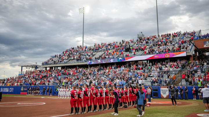 Teams stand for the Nation Anthem before game 3 between Texas Tech and Ole Miss at the Women’s College World Series at Devon Park in Oklahoma City, on Thursday, May 29, 2025.