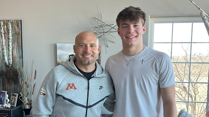P.J. Fleck (left) with Roman Voss (right) during an in-home visit in January. 